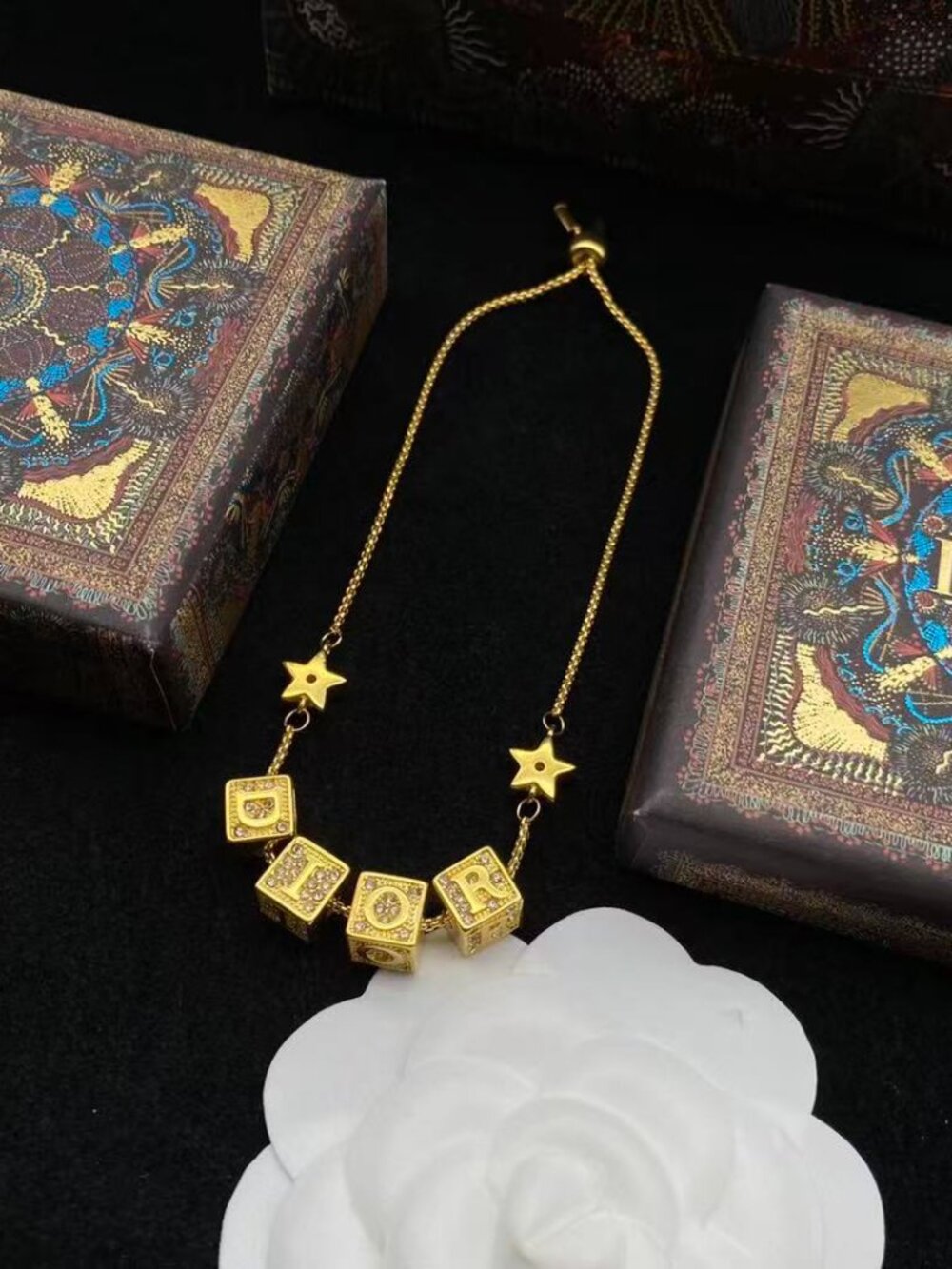 Dior Gold-Tone "DIOR" Crystal Cube & Star Adjustable Bracelet